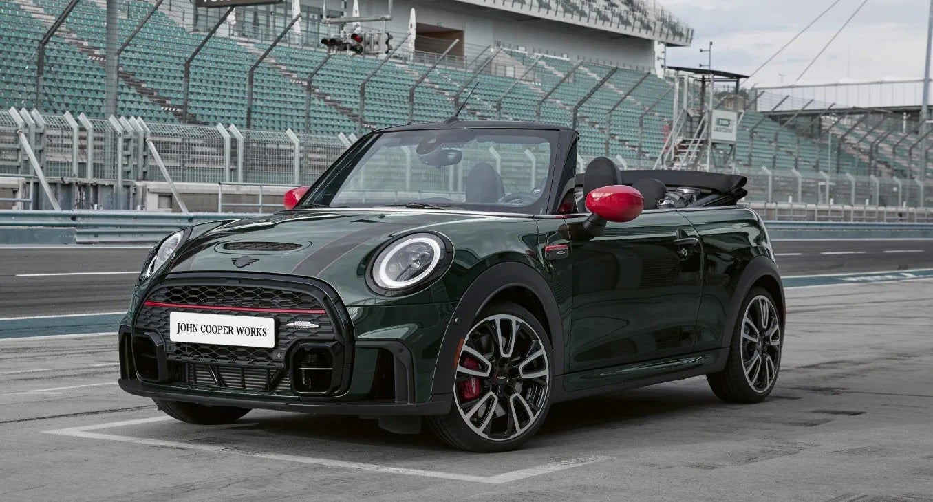 The JCW MINI Convertible zooming on the racetrack. | MINIDemo1 in Derwood MD